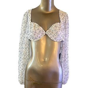 White w/ mini blue flowers. Full sleeve, bra top, backless w/ tie